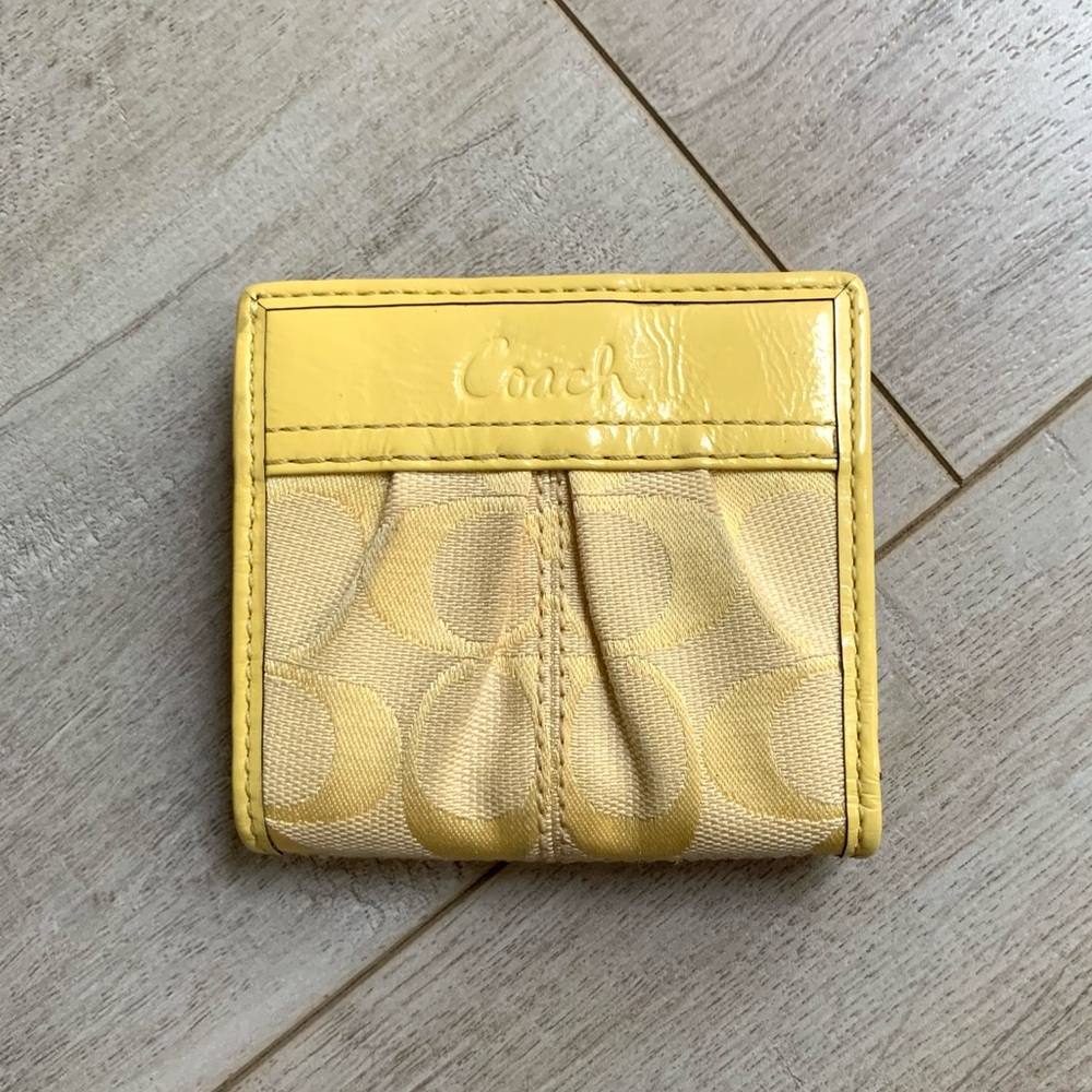 Coach small yellow bifold coin wristlet wallet